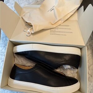 Leather Slip-On Sneakers in Black with White Sole